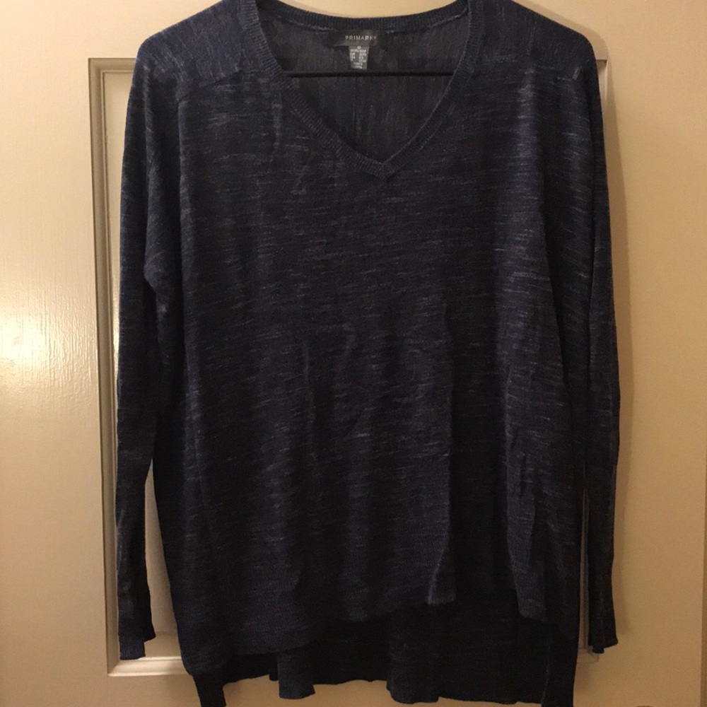 Navy blue sweater.